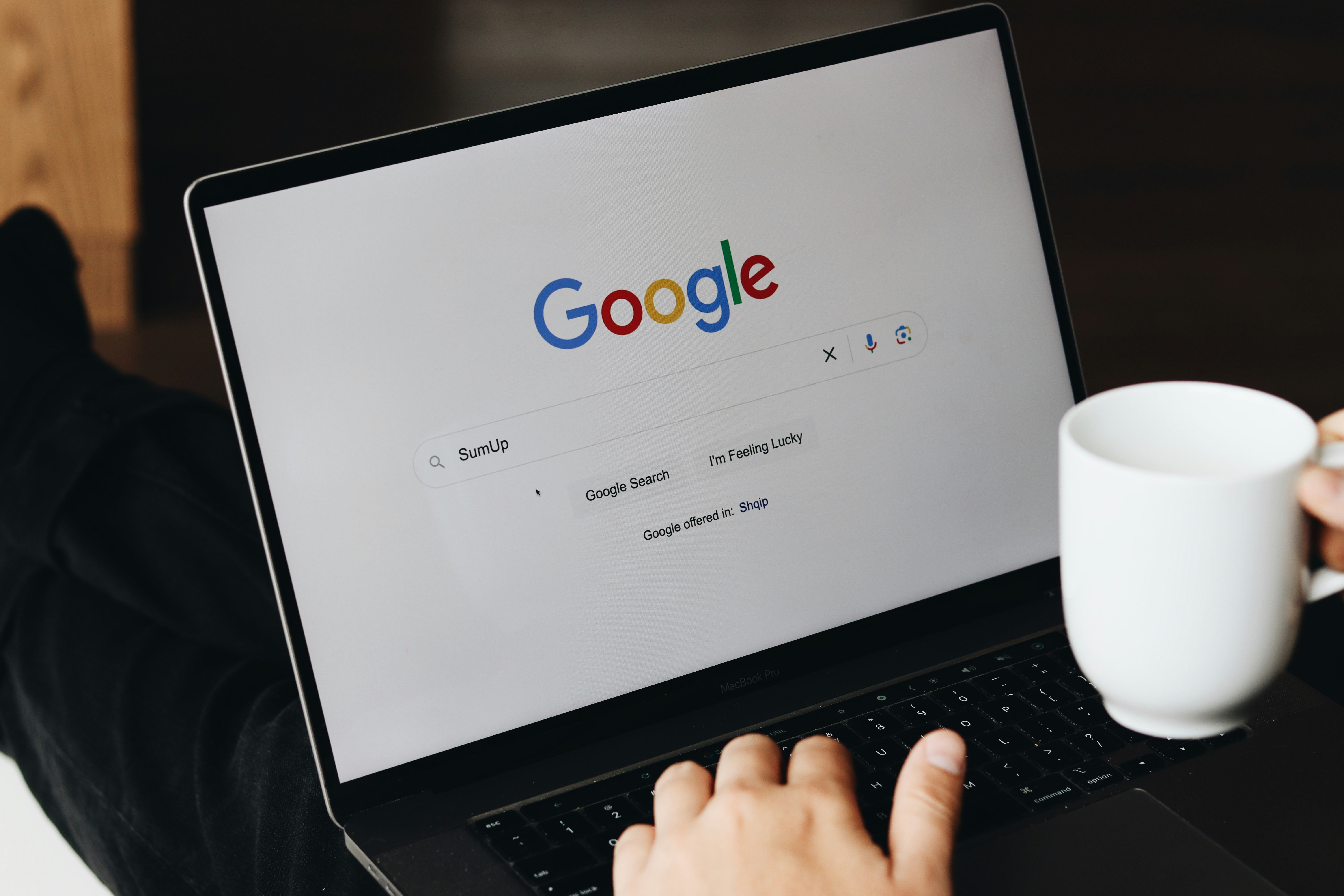laptop displaying Google homepage
